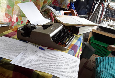 typewriter and written notes