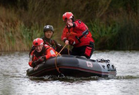 water safety training - rescuers on dinghy
