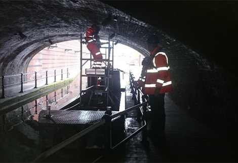 canal tunnel with workmen