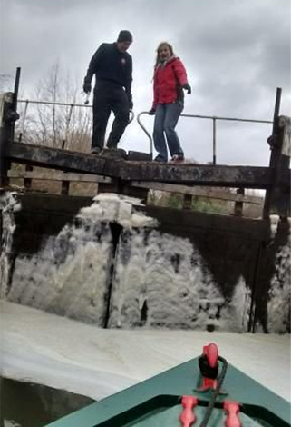 couple operating lock in snow