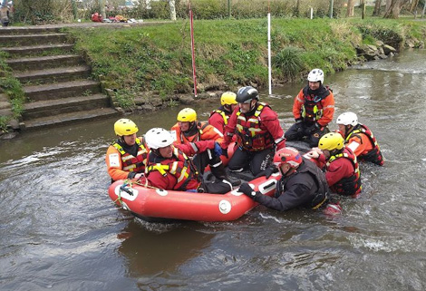 water safety training - men on inflatable rib