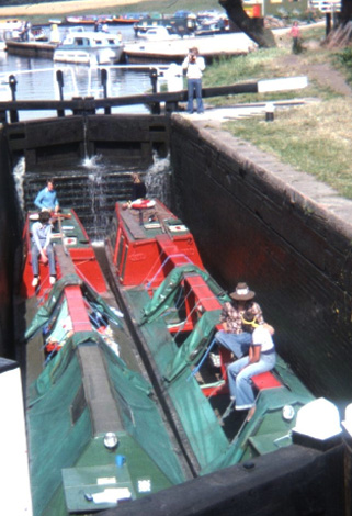 Stenson lock, minutes before a potential disaster - CanalsOnline Magazine pair of working boats in Stenson Lock