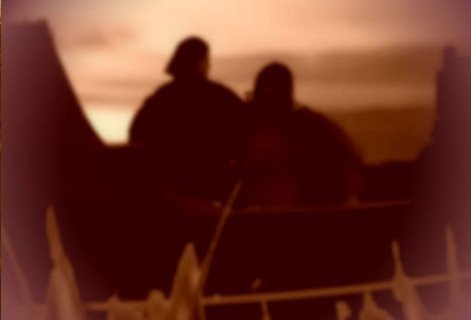 silhouettes agains a twilight sky